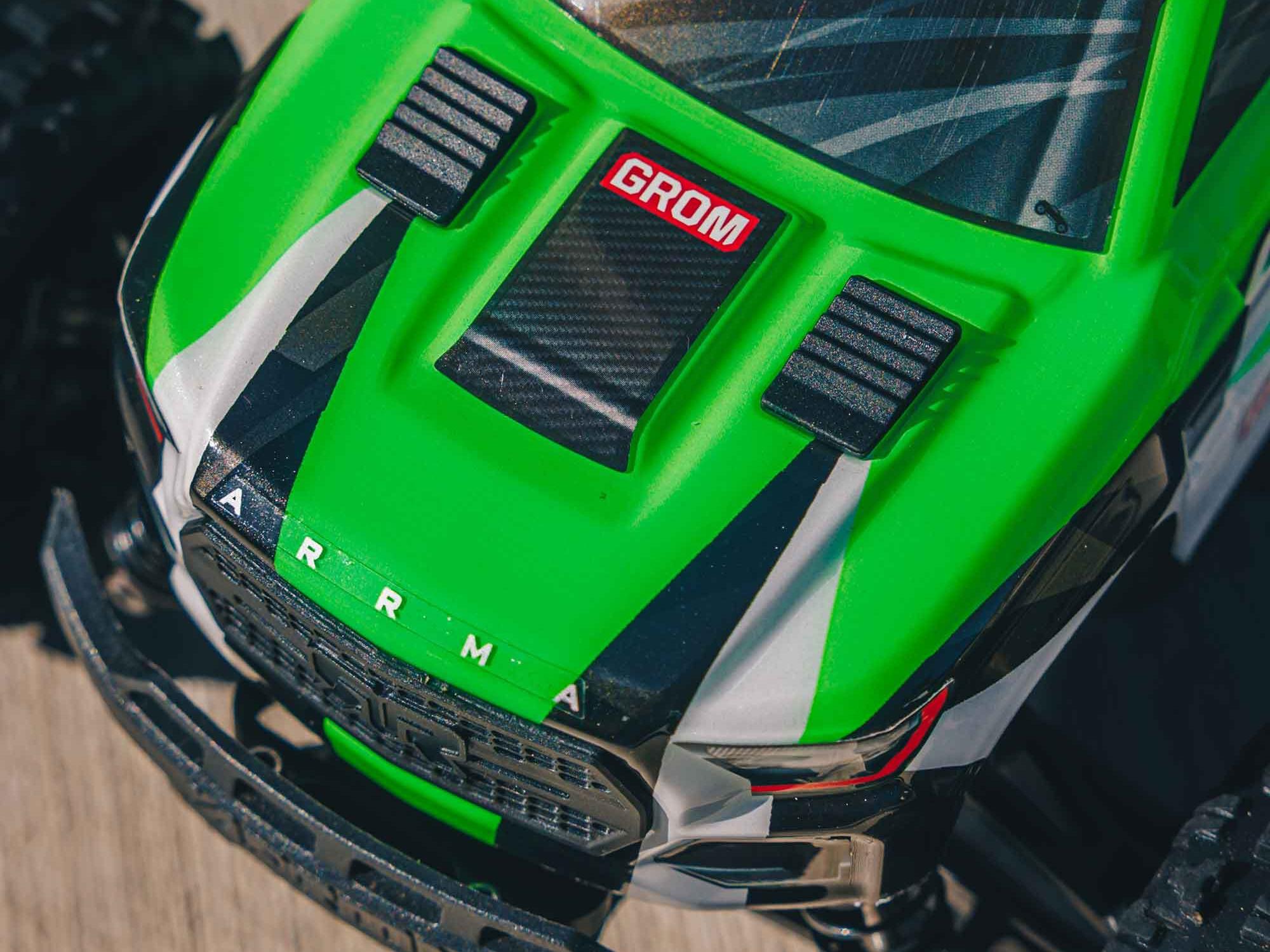 Arrma 1/18 GRANITE GROM MEGA 4X4 MT with Battery & Charger Green - Image 15